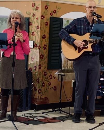 Wylie and Dawna leading worship at Gardens Care Center