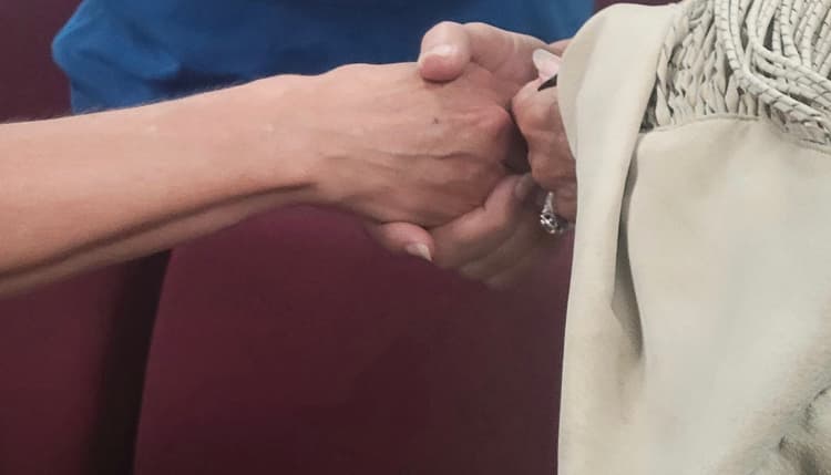 Hands clasped together in fellowship