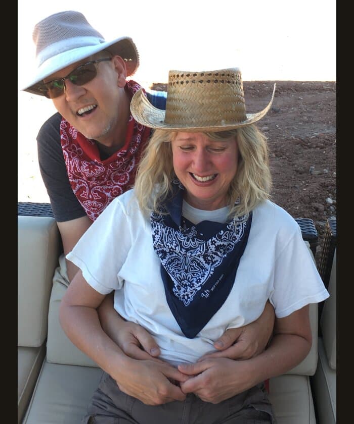 Wylie and Dawna laughing together outdoors