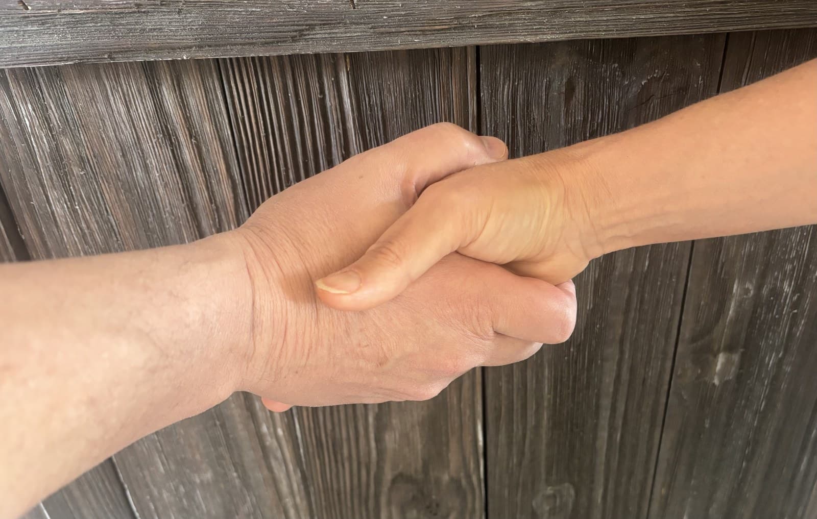 Hands clasped together in fellowship